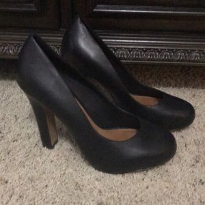 Aldo black leather high heels in great condition.